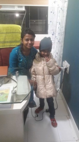 Dr. Pallavi With Child Patient